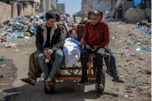 34 Palestinians, including Those Waiting for Aid, Killed in Israeli Strikes on Central Gaza