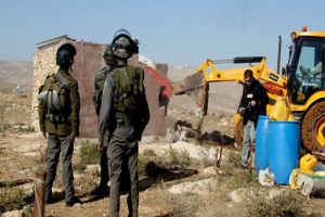 Israeli Forces Order Palestinian Brothers to Dismantle Agricultural Structures in Jordan Valley
