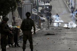 2 Palestinian Youths Injured by Israeli Forces during Clashes in Qalandia Refugee Camp