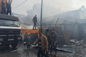 ارتفاع عدد ضحايا حريق سوق مخيم النصيرات إلى 21