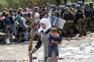 Palestinian Woman and Her Sightless Son Launch Cry for Help from Greek Camp