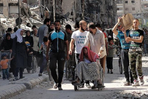 Displaced Families Denounce Movement Crackdown on Yarmouk Camp for Palestinian Refugees