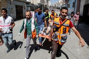 Palestinian Youth Injured by Israeli Forces in AlKhalil Refugee camp