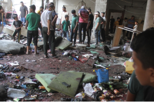 Israeli Military Kills at Least 100 Palestinians in Gaza School Bombing during Fajr Prayer