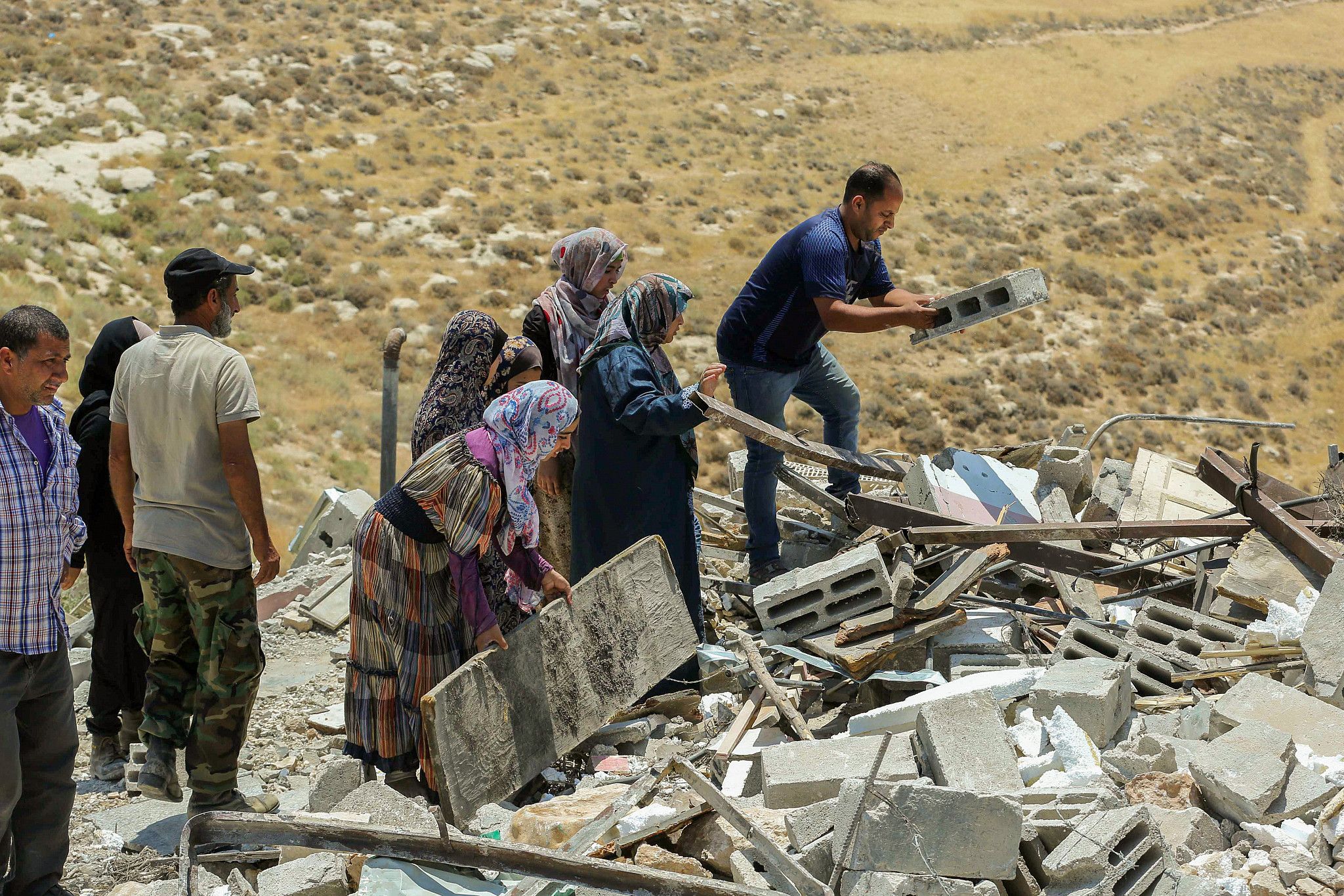 Israeli Forces Displace Palestinian Families after Demolishing Their Homes 