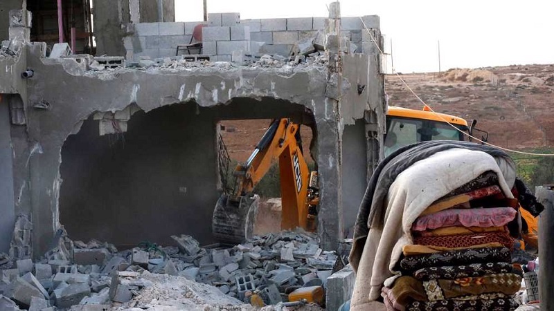 Palestinian Ordered by Israeli Forces to Demolish His Family Home
