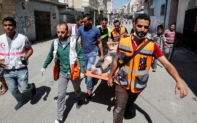 Palestinian Youth Injured by Israeli Forces in AlKhalil Refugee camp